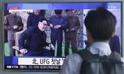 A man watches a TV news program showing a file footage of North Korean leader Kim Jong Un, at Seoul Railway station in Seoul, South Korea, Wednesday, Aug. 24, 2016. North Korea on Wednesday fired a ballistic missile from a submarine into the sea in an apparent protest against the start of annual South Korea-U.S. military drills, Seoul's military said. The letters read "North Korea fired a missile during UFG, Ulchi Freedom Guardian." (AP Photo/Ahn Young-joon)
