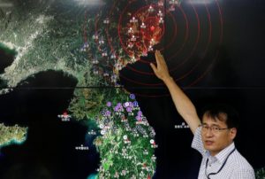 Ryoo Yong-gyu, Earthquake and Volcano Monitoring Division Director, points at where seismic waves observed in South Korea came from, during a media briefing at Korea Meteorological Administration in Seoul