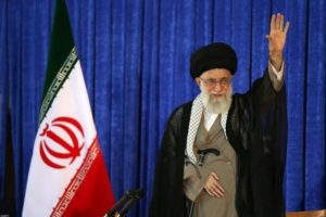 Iran's Supreme Leader Ayatollah Ali Khamenei waves as he gives a speech on Iran's late leader Khomeini's death anniversary, in Tehran